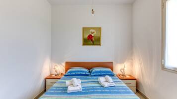 4 slaapkamers, een strijkplank/strijkijzer, beddengoed