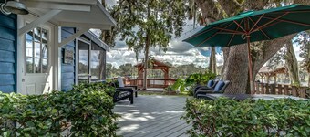 The Cozy Euphoric cottage nestled in nature with relaxing  River front views.