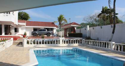 Relax Near The Beach! 5 Bedroom Cottage with A/C & top amenities in Playa Medoza