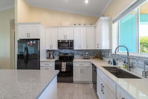 Fridge, microwave, oven, stovetop - Villa Lucie | Canalfront pool home, 5 bedrooms (Ramrod Key)