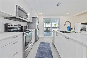 Fridge, microwave, dishwasher, coffee/tea maker