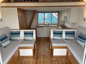 Interior - Beach Hut situated directly on the beach at Mudeford Spit, with an uninterrupted view across to the (Christchurch)