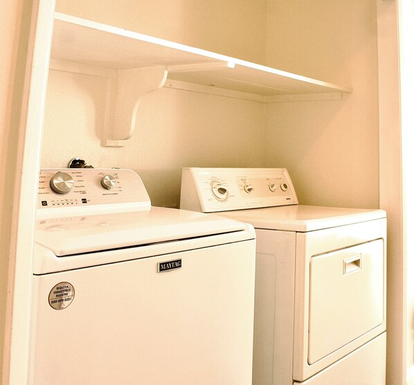 A laundry room with two Maytag washers and a dryer. - Spacious Upper Unit In Newport Beach w/ Ocean View, Free WIFI, and pet-friendly (Newport Beach)