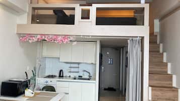 Fridge, microwave, electric kettle, cookware/dishes/utensils