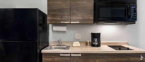 Fridge, microwave, stovetop, coffee/tea maker