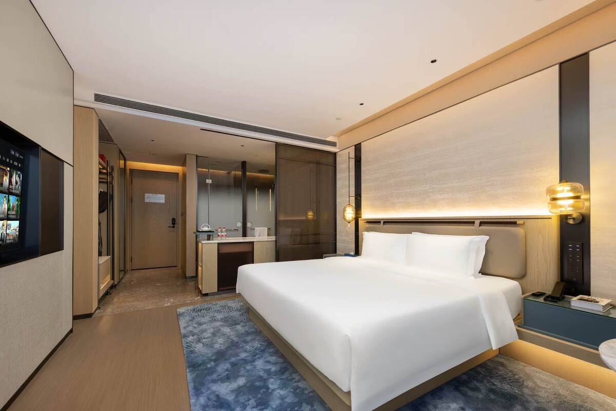 Premium bedding, memory-foam beds, minibar, desk