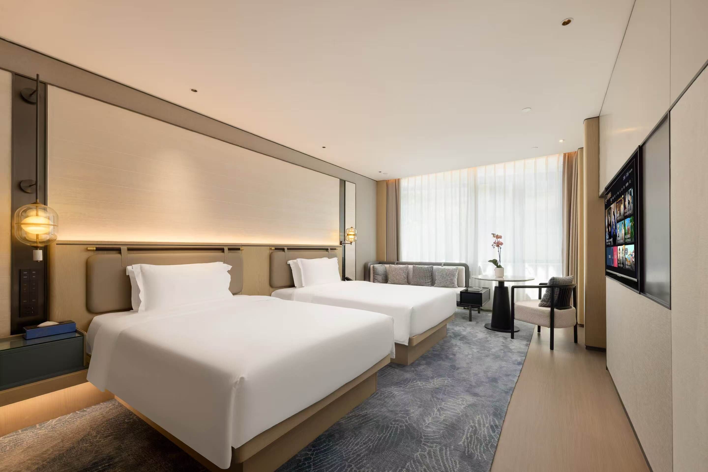Premium bedding, memory-foam beds, minibar, desk