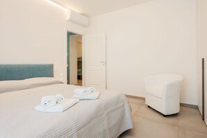 2 habitaciones, tabla de planchar con plancha, wifi y ropa de cama
