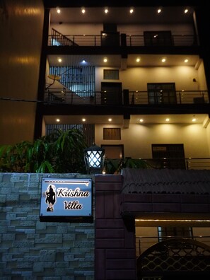 A multi-story building with a sign reading "Krishna Villa." - Krishna Villa  (Varanasi)