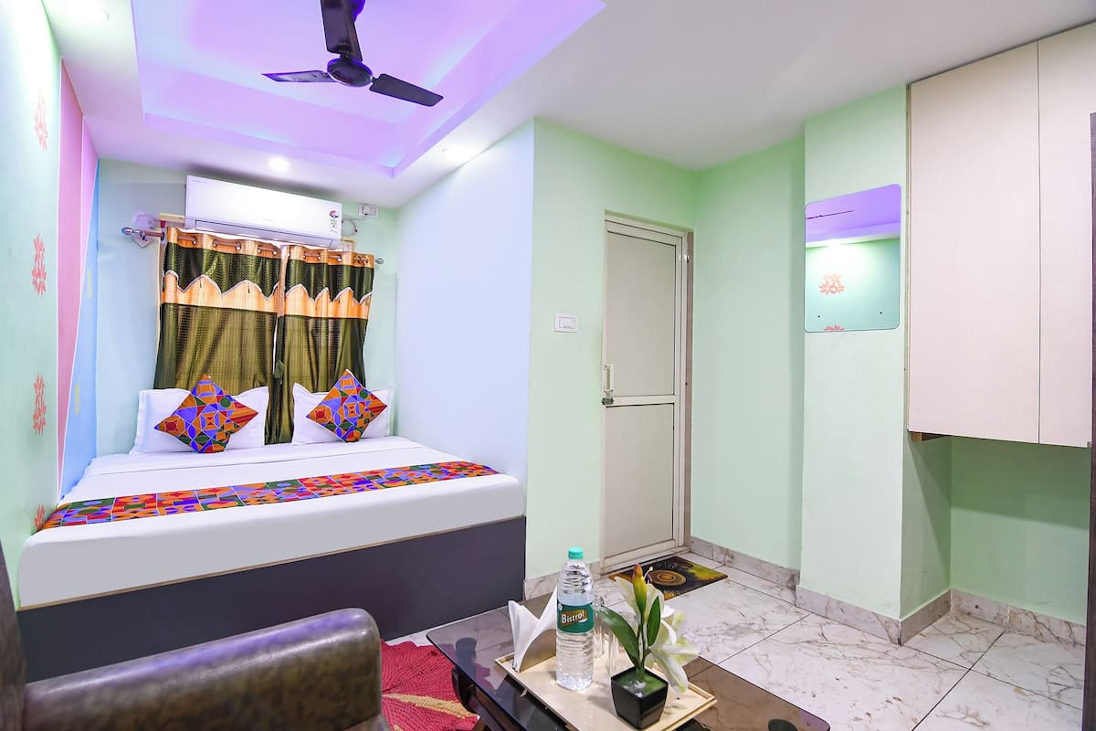 Deluxe kamer | Lakens van Egyptisch katoen, luxe beddengoed, een kluis op de kamer