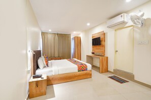 尊荣客房 | 埃及棉床单、高档床上用品、客房内保险箱、免费 WiFi