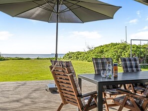 Outdoor dining - "Ørn" - 5m from the sea by Interhome (Bjert)