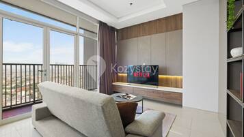 Apartment, 3 Bedrooms, City View | Living area | Flat-screen TV