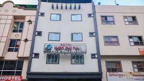 A hotel named "Hotel Kastui Continental" with a modern facade, multiple windows, and balconies. - Hotel Kasturi Continental (Bhopal)