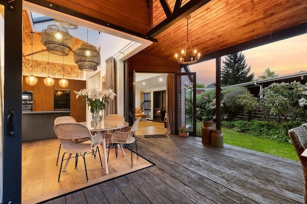 Entertainment lounge, with open flow dining area, kitchen and private spacious deck.
