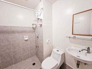 Shower, hair dryer, towels, soap
