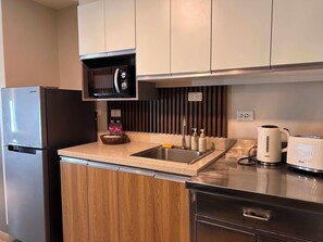 Fridge, microwave, electric kettle, toaster
