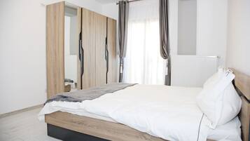 Family Double Room, City View | Iron/ironing board, free WiFi, bed sheets