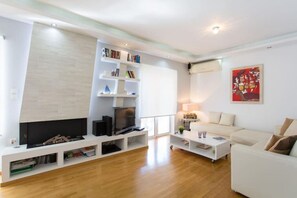 TV, fireplace - ONE block from the sea Family house at Floisvos (Paleo Faliro)