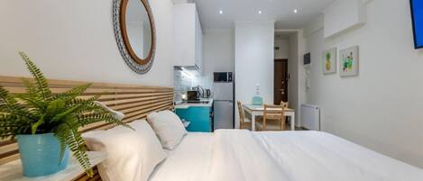 1 غرفة نوم ومكواة/لوح كي وواي فاي وملاءات أسرّة