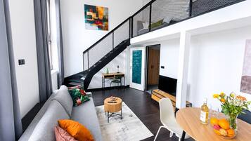 Superior Room | Living area | 32-inch Smart TV with cable channels, Netflix, streaming services