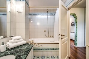 Shower, jetted bath, hair dryer, bidet