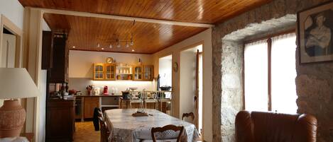Enjoy meals in this dining area with a large table and comfortable seating for four.