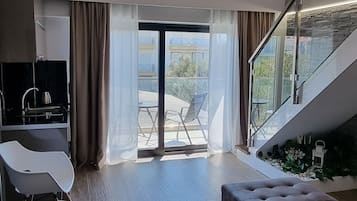 Superior Suite, Partial Sea View | 1 bedroom, minibar, in-room safe, soundproofing