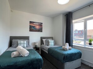 3 slaapkamers, een strijkplank/strijkijzer, reisbedje, gratis wifi