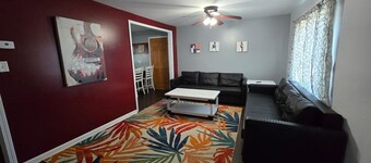 Two Bedroom Cabin - "The Big One" - This spacious cabin gets it's name honestly! Cabin is 800 sq ft with two-bedrooms feature three (3) queen beds, one (1) full size bed, and two (2) futons allow for a max of twelve (12) people. Conveniently located