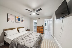 1 bedroom, desk, iron/ironing board, travel crib