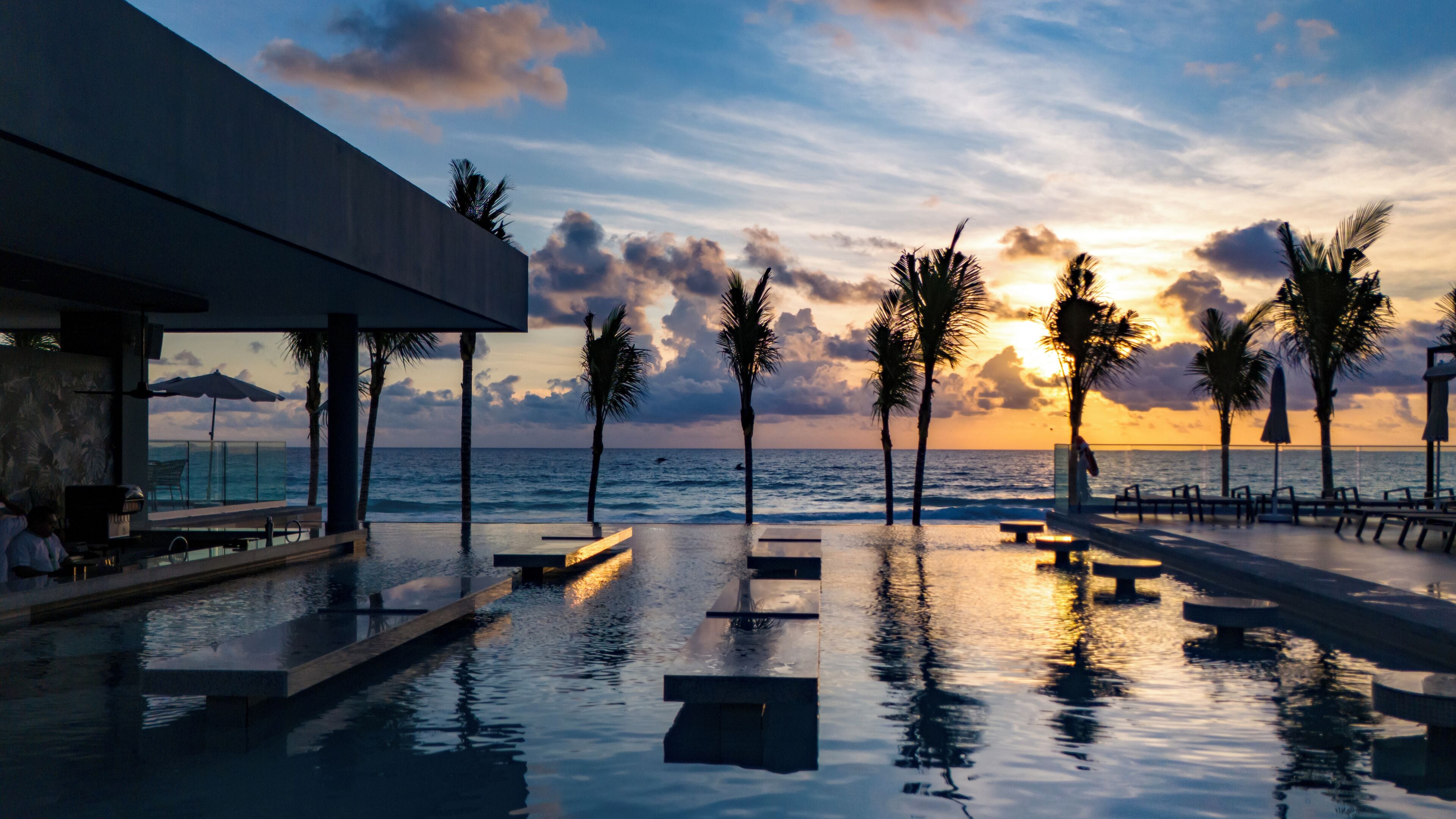 6 bars/lounges, 2 swim-up bars