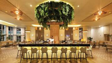 6 bars/lounges, 2 swim-up bars