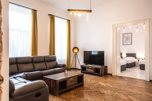 Apartment, Multiple Beds, Kitchen | Living area
