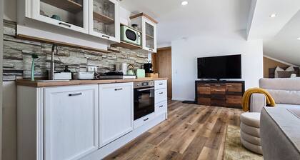 Alpha Apartments: Central Charm, Skylight Comfort