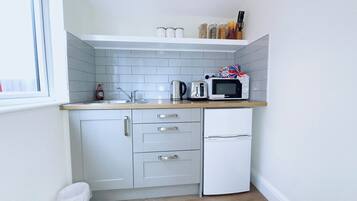 Apartment | Private kitchen | Fridge, microwave, stovetop, electric kettle