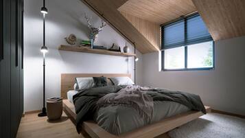 Un dormitorio moderno con techo inclinado, cama con estructura de madera, alfombra blanca y ventana con persianas.