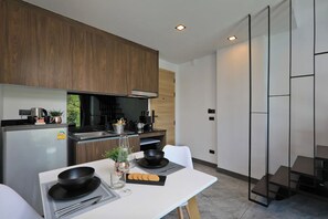 Design Condo, Balcony, Pool View | In-room dining - NaiHarn Duplex with Pool View UTL A310 (Rawai)