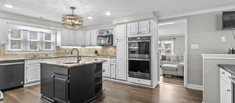 Outdoor private pool. 4 bedroom 2.5 bath home short drive to beach. Fire pit. Sleeps 8.