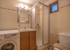 Hair dryer, towels, soap, toilet paper