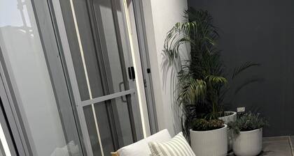 Luxury coastal townhouse only minutes from beach, restaurants and shops.