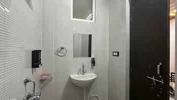 Standard Room | Bathroom | Shower, free toiletries, towels, soap