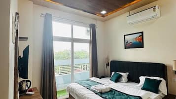 Deluxe Room | Memory-foam beds, laptop workspace, rollaway beds, free WiFi