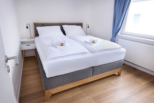 Design Apartment mit Kingsize-Betten & Balkon