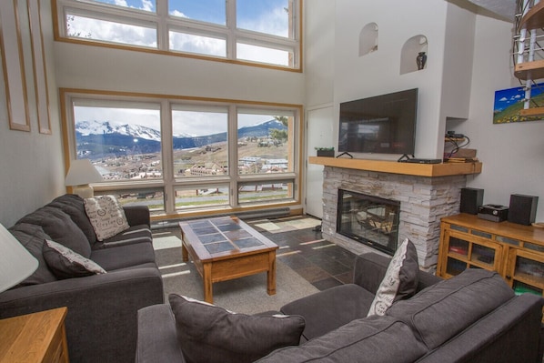 Smart TV, fireplace, books