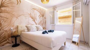 2 chambres, fer et planche à repasser, Wi-Fi, draps fournis