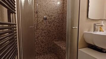 Hair dryer, bidet, towels, soap