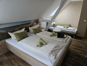 Triple Room | In-room safe, desk, laptop workspace, blackout drapes