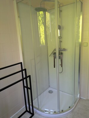 Shower, hair dryer, towels, soap