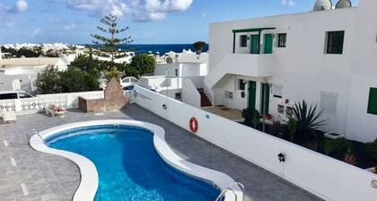 Modern 2-Bedroom Air-Conditioned Apartment Near Los Pocillos Beach